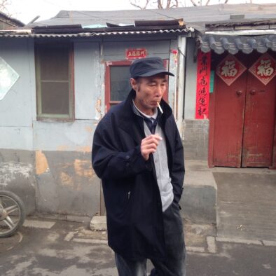 Walking through Beijing narrow alleyways (Hutong) near Miaoying Temple